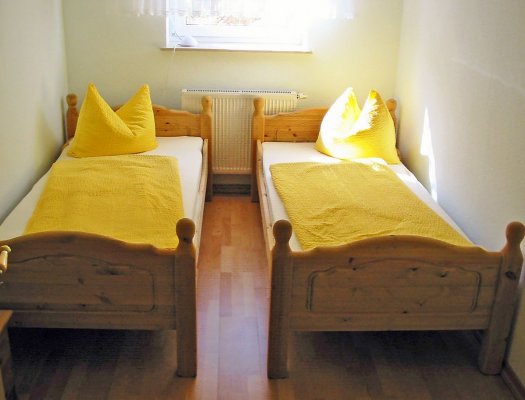 Zweibettzimmer mit Platz für Kinderbett